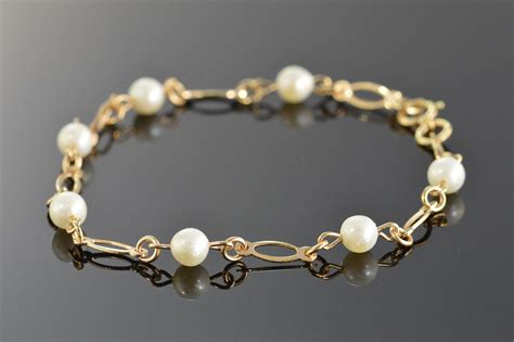 G Link bracelet in metal with pearls 